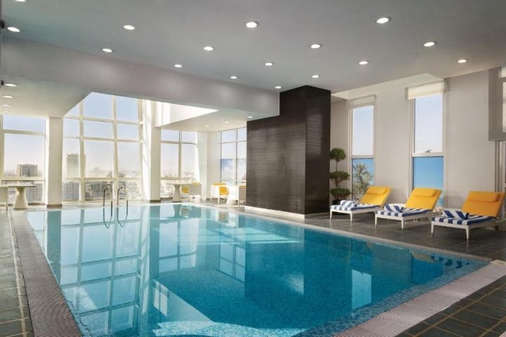Ramada Encore by Wyndham Doha Pool photo 2